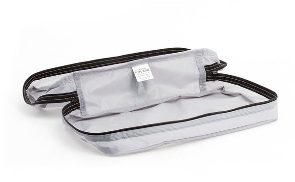 A empty and open Northwest Sky (light grey) Aether End Pocket Packing Cube for the Aeronaut 45.